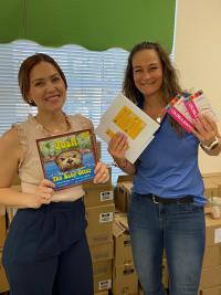 volunteers with books