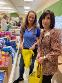 volunteers stuffing bags