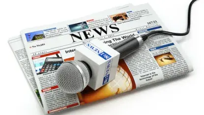 newspaper and microphone