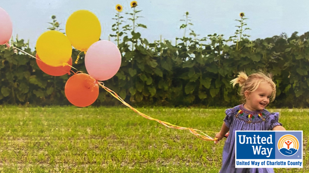 Leah running with balloons